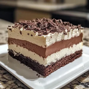 TRIPLE CHOCOLATE MOUSSE CAKE